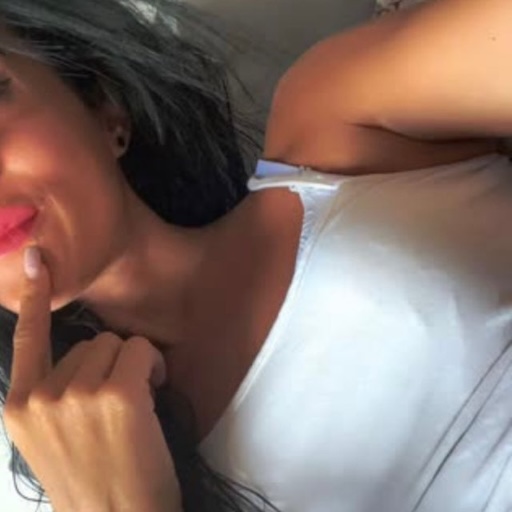 Graciela making a shh gesture